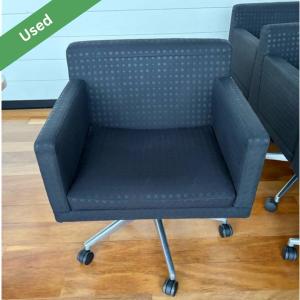 Used black fabric adjustable office chair with armrests and wheels