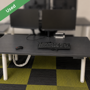 Used electric sit stand workstation with height adjustable desk in Sydney
